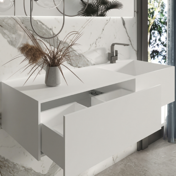 Lavabo suspendido con mueble lateral integrado y cajón de almacenamiento