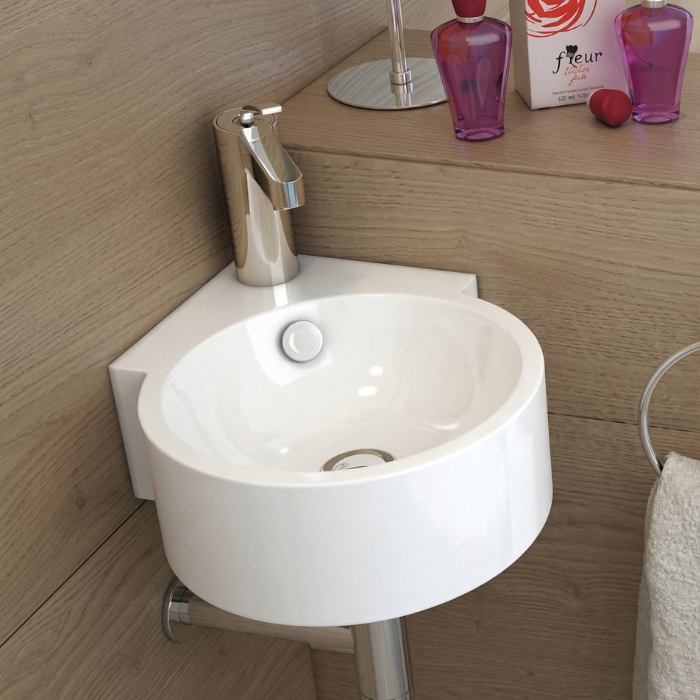 Lavabo redondo suspendido en porcelana blanca para baño pequeño