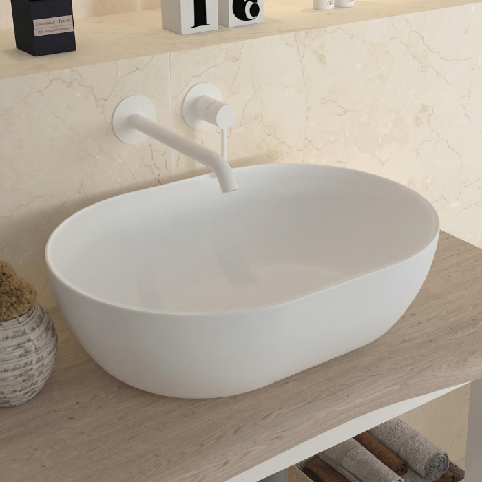 Lavabo elíptico sobre encimera sin rebosadero de diseño moderno