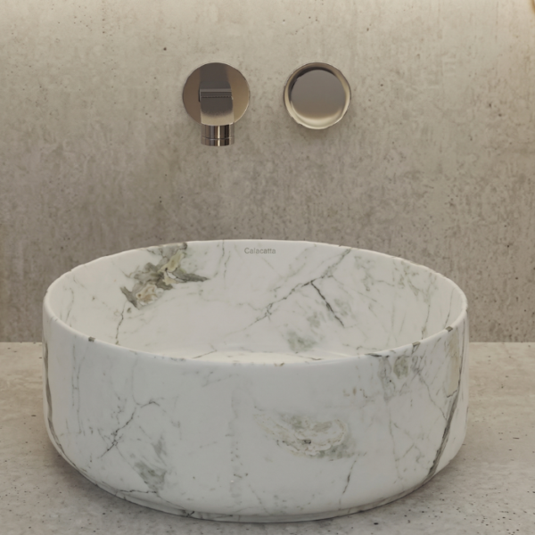 Lavabo artesanal redondo en cerámica personalizada sobre encimera