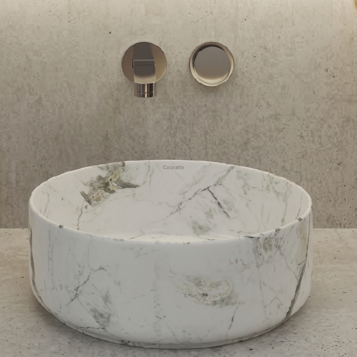 Lavabo artesanal redondo en cerámica personalizada sobre encimera
